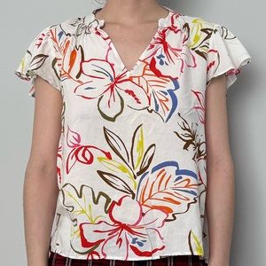 White floral blouse with ruffle sleeves